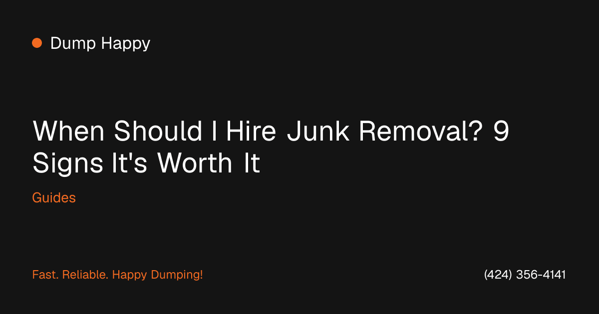 Junk removal crew loading furniture and boxes into a truck in Los Angeles